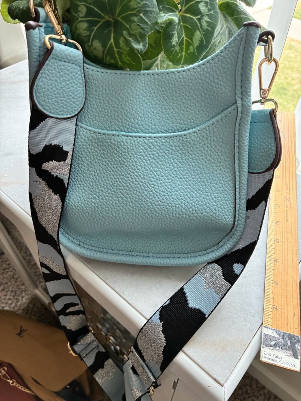 Light Blue Leather crossbody Bag with Patterned Strap